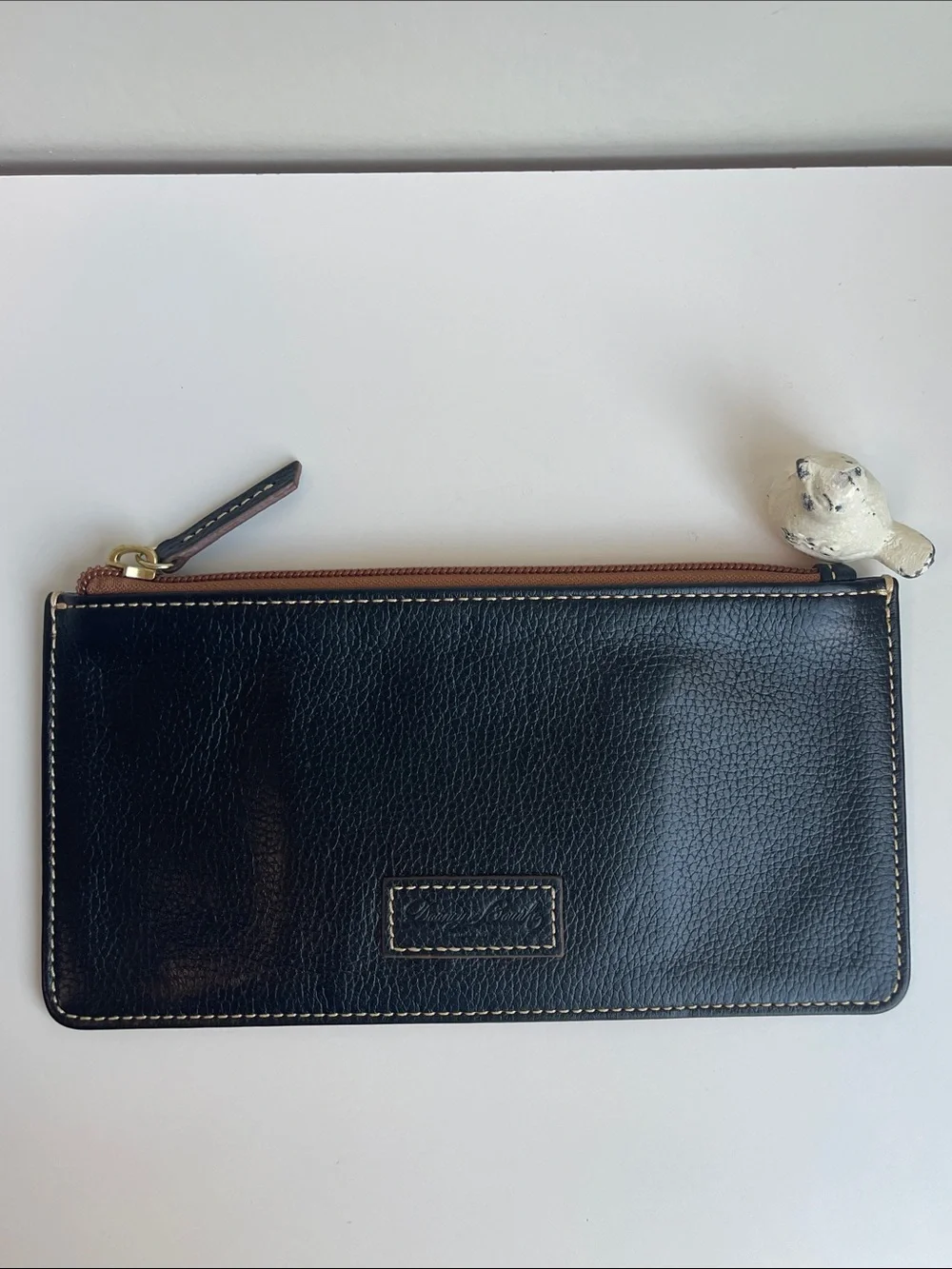 Dooney & Bourke Pebbled leather Slim Clutch